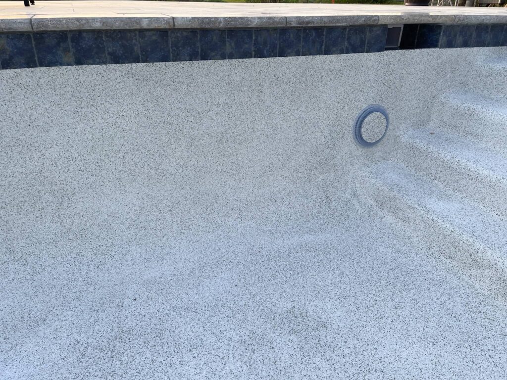 close up of a pool wall that is being built