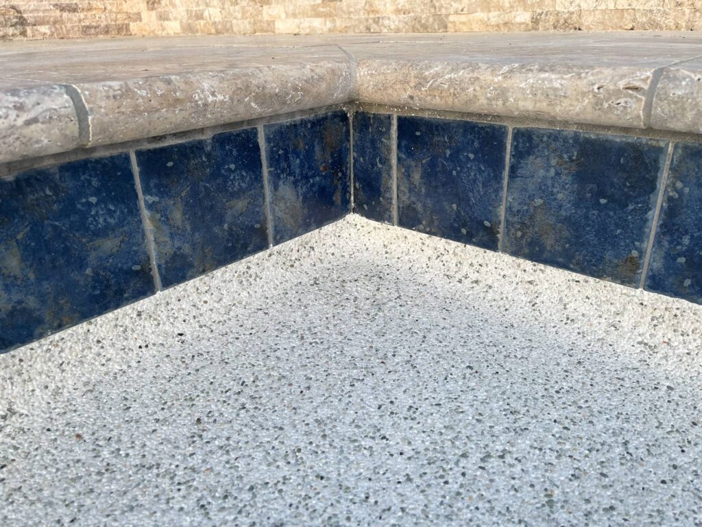pool waterline tile of a pool that is under construction